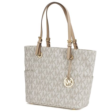 michael kors jet set large tote vanilla|Michael Kors bag with airplanes.